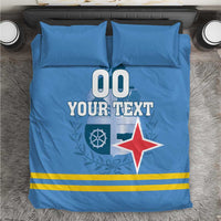 Blue bedding set with pillows; duvet shows '00 YOUR TEXT' and red star flag
