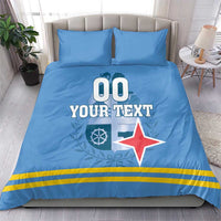 Blue bedding set with pillows; duvet shows '00 YOUR TEXT', red star, and gold stripes