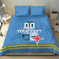 Blue bedding set with pillows; duvet shows '00 YOUR TEXT', red star, and gold stripes