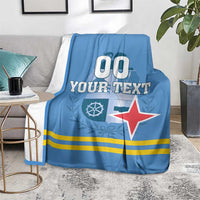 Blue throw blanket with custom text, red star, and yellow stripes over flag pattern