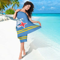 Blue sarong featuring crest, red star, and yellow stripes, held across front