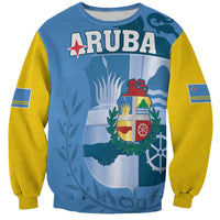 Blue crewneck sweatshirt with yellow sleeves, Aruba graphic patch with crest and flags