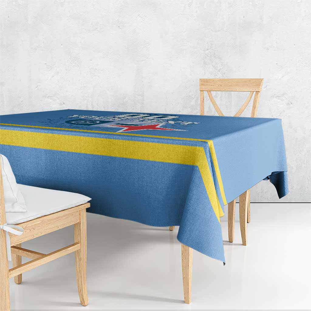 Blue rectangular tablecloth with yellow border stripe and crest graphic, flat on table