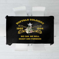 Black tablecloth featuring bold yellow “Buffalo Soldiers” and slogan text