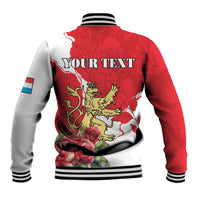 Red baseball jacket back with lion crest and roses, striped rib collar and cuffs