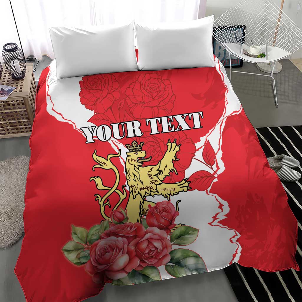 Close-up red personalized duvet cover with lion crest, roses, white pattern, and pillow