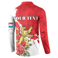 Back button sweatshirt with lion crest, roses, and map graphic in red and white
