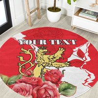 Round red area rug with lion crest, roses, and customizable text 'YOUR TEXT'.