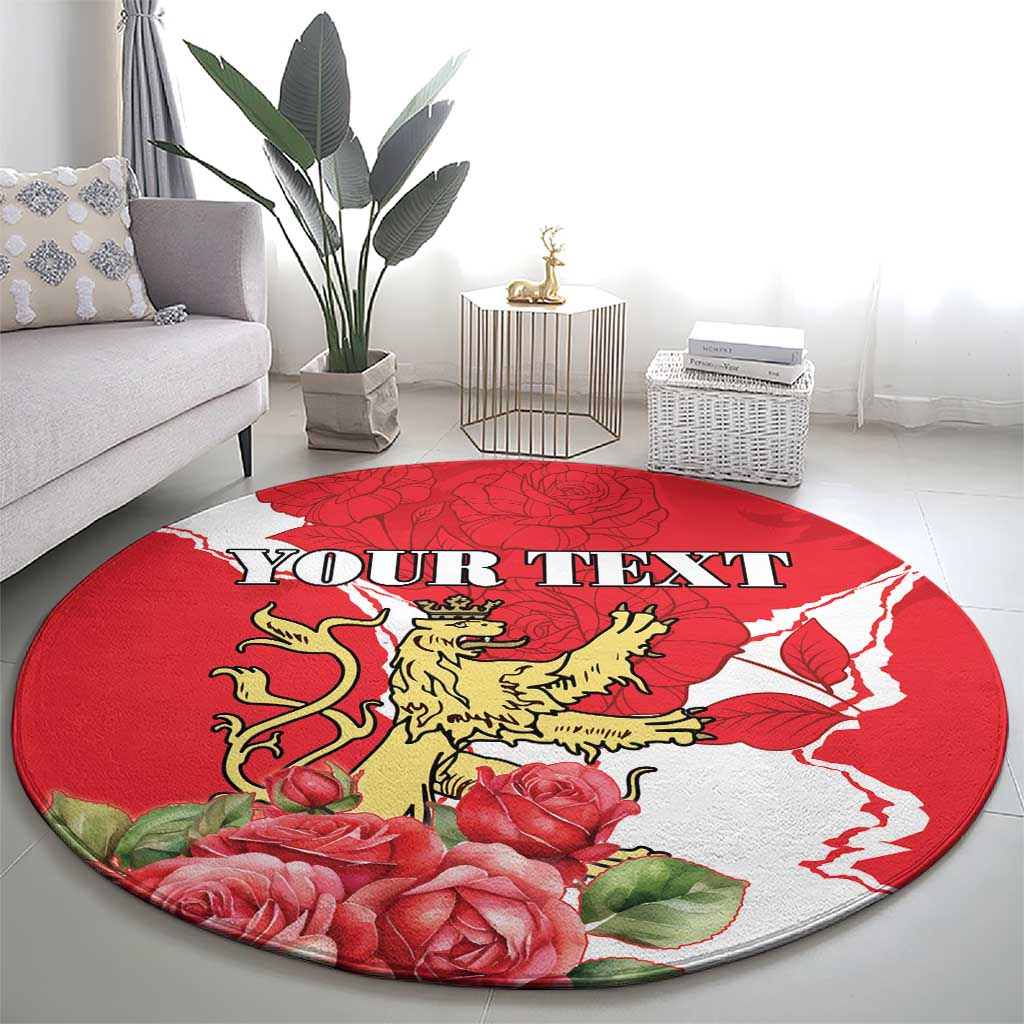 Round red area rug with lion crest, roses, and 'YOUR TEXT' printed prominently.