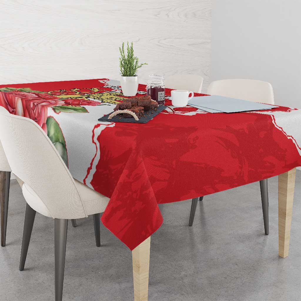 Red rose tablecloth with white border pattern on dining table