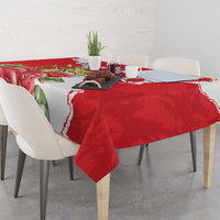 Red rose tablecloth with white border pattern on dining table