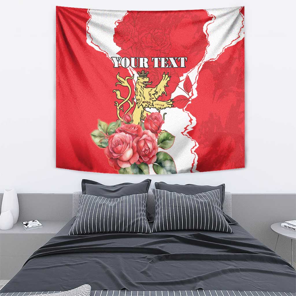Red tapestry wall hanging featuring roses, crowned lion crest, white scalloped border, personalized text