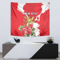 Red tapestry wall hanging with white wavy border, roses and lion coat-of-arms, personalized text