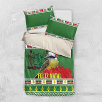 Green Feliz Natal bedding set with bird motif and coordinating pillowcases on light background