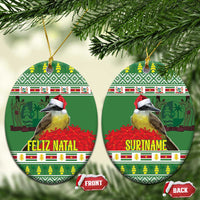 Green star-shaped ornament pair with kiskadee birds—Feliz Natal left, Suriname right