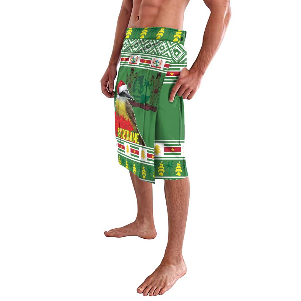 Green tropical Christmas lavalava shorts with side bird graphic and striped hem