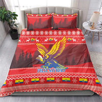 Red Christmas bedding set on bed with two shams, condor, trees, and FELIZ NAVIDAD text
