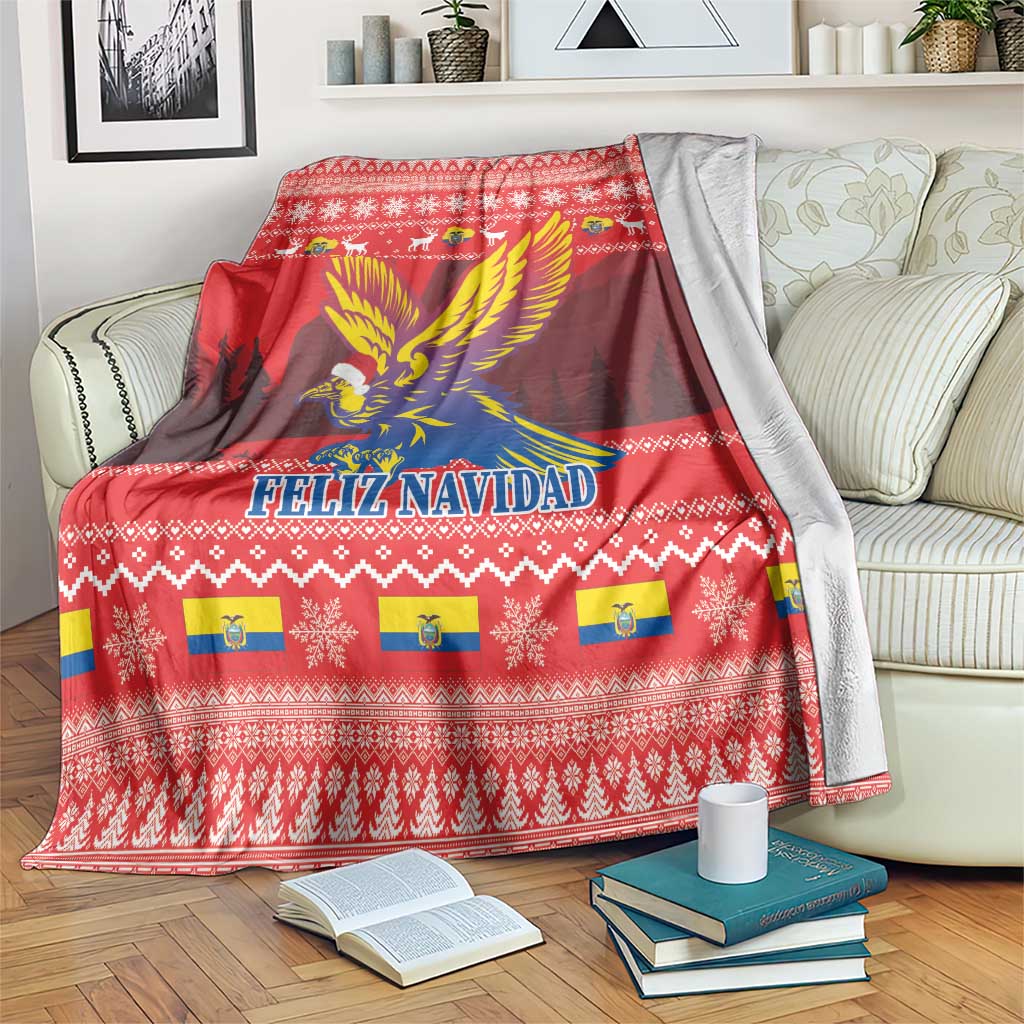 Red Feliz Navidad blanket spread on a sofa with condor graphic and repeating motifs
