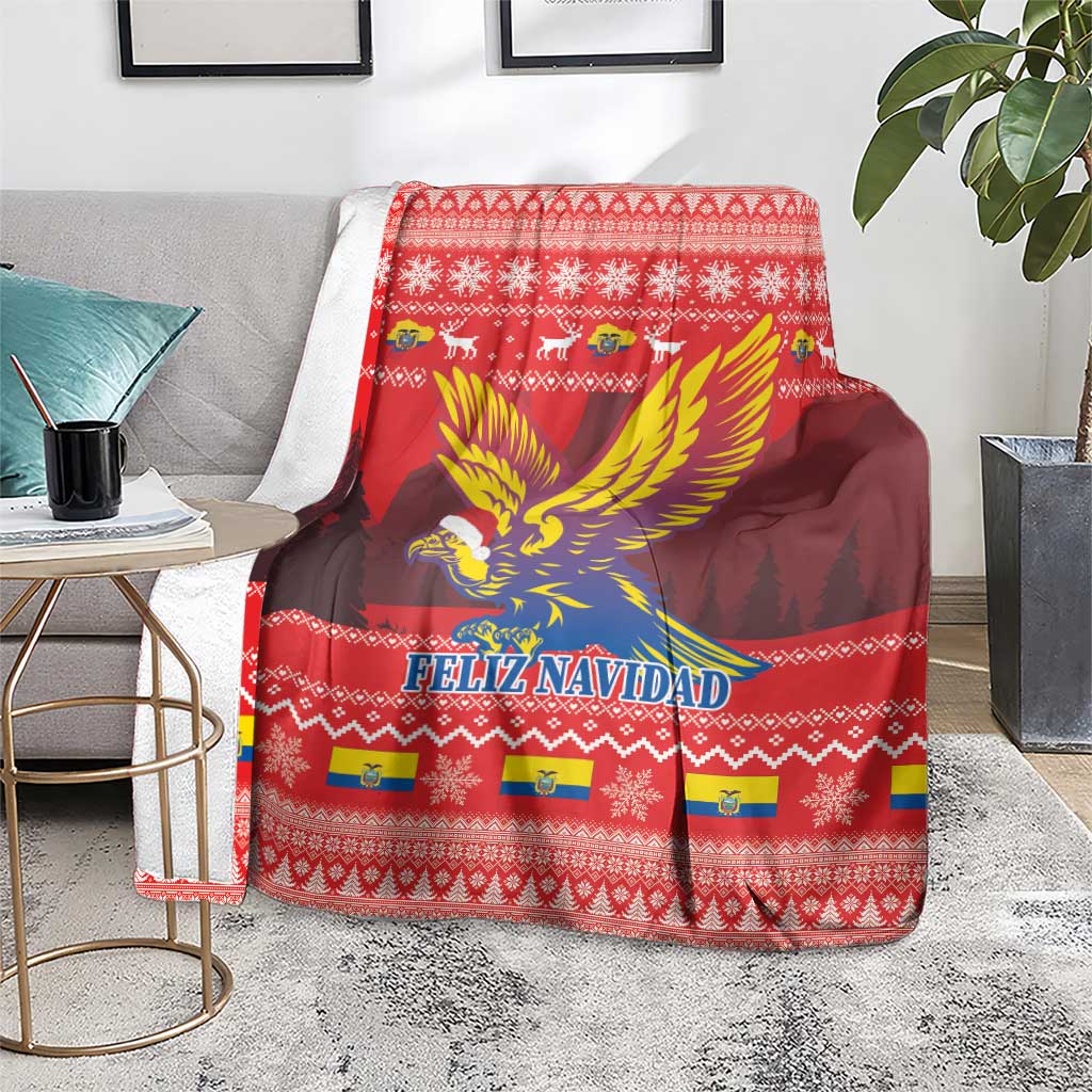 Red Feliz Navidad blanket on couch with condor wings design and holiday border