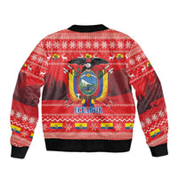 Red Christmas bomber jacket back with large Ecuador crest, eagle and condor designs, ribbed hem