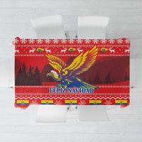Red Christmas tablecloth with Andean condor graphic and “FELIZ NAVIDAD” text