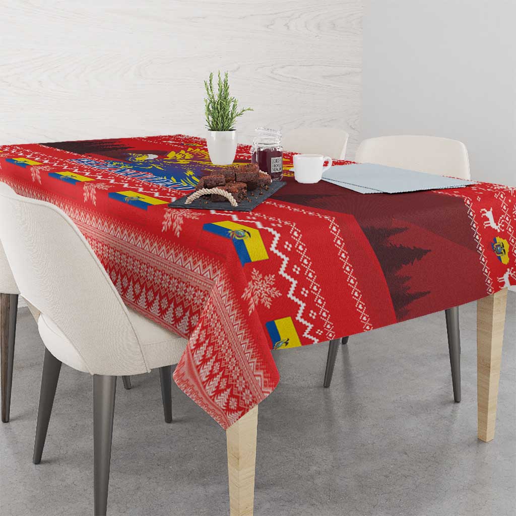 Red Christmas tablecloth featuring condor artwork, patterned borders, and festive icons