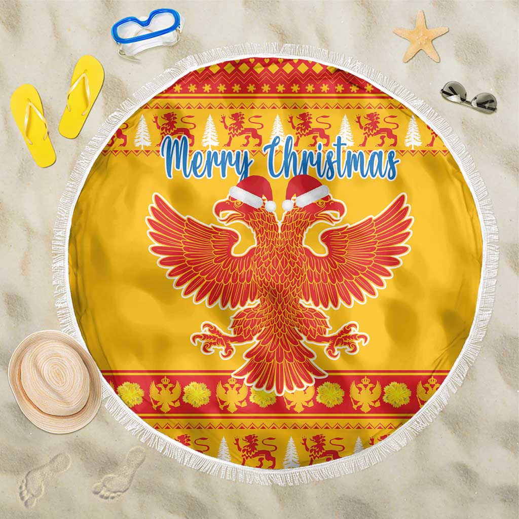 Yellow Christmas beach blanket with white fringe, round eagle motif and Merry Christmas headline