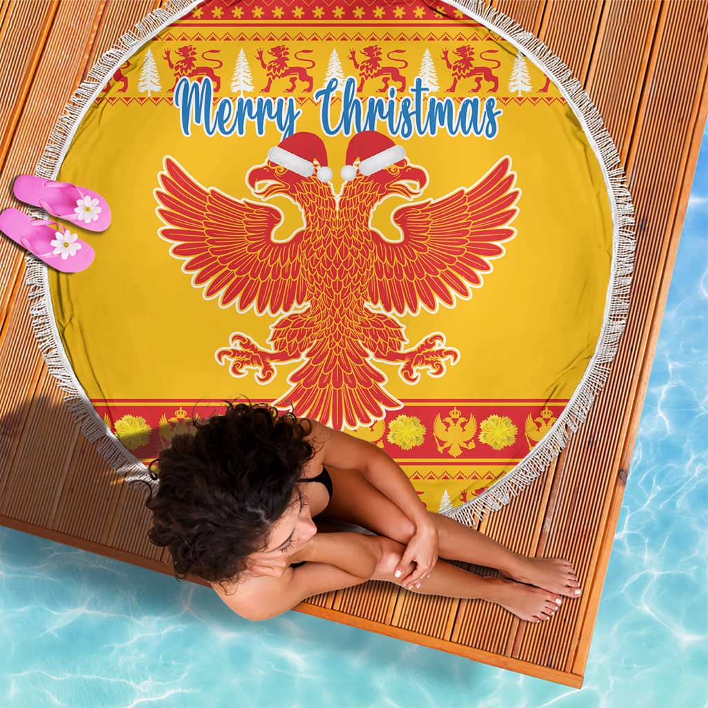 Yellow Christmas beach blanket with white fringe, round eagle emblem and Merry Christmas text