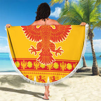 Round yellow Christmas beach blanket with white fringe, large eagle graphic and holiday border