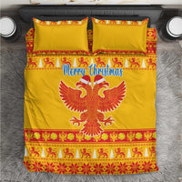 Yellow Christmas bedding set with “Merry Christmas” text, double-headed eagle, and red trim
