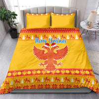 Yellow Christmas bedding set with “Merry Christmas” text, double-headed eagle, and patterned edge