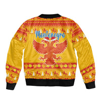Yellow unisex Christmas bomber jacket, back eagle graphic with Montenegro and holiday borders