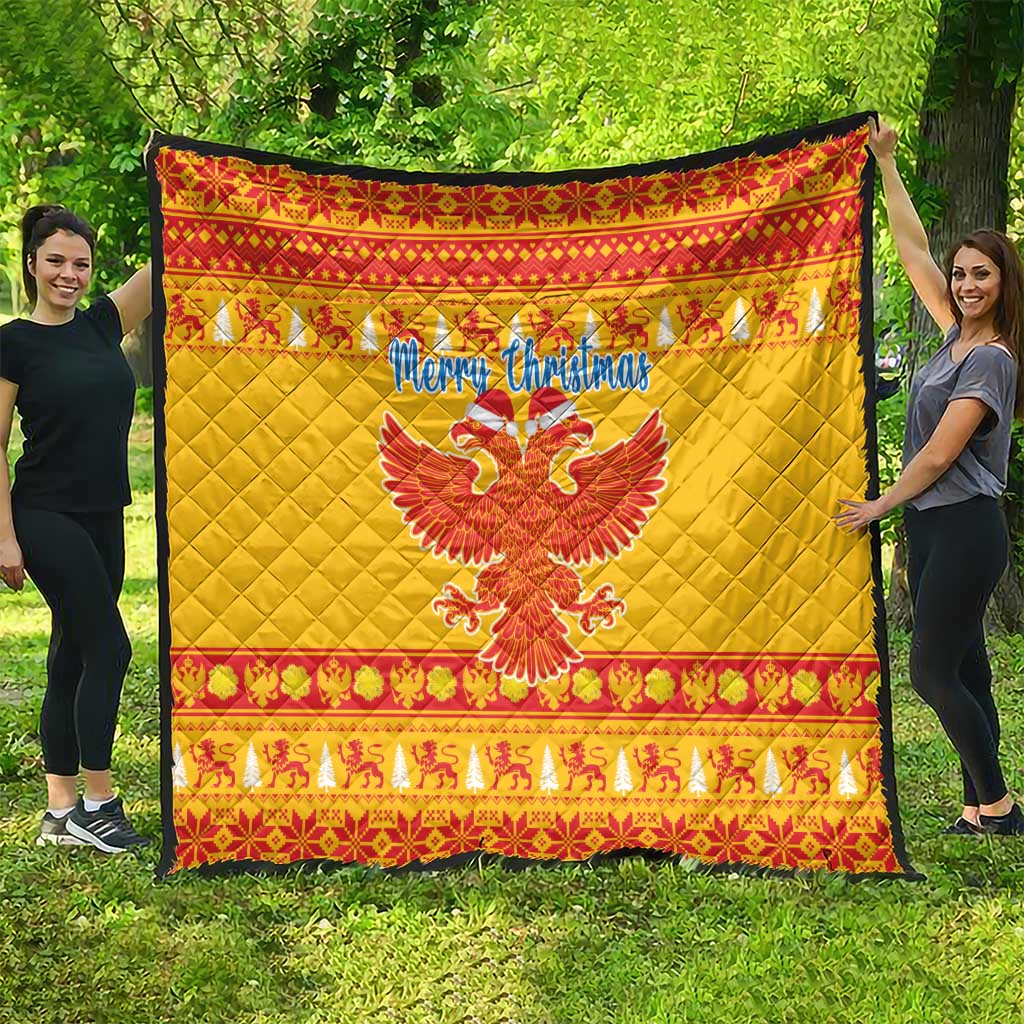 Yellow Christmas quilt with red border, “Merry Christmas” and double-headed eagle motif