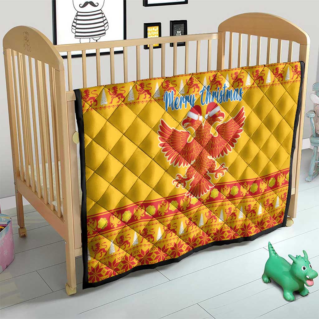 Yellow crib quilt with red trim, “Merry Christmas” and double-headed eagle center