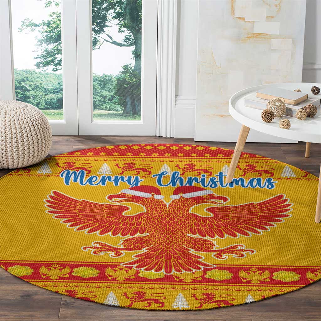 Yellow round Christmas rug with double-headed eagle and “Merry Christmas” near table