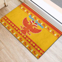 Yellow Christmas rubber doormat with red patterned border and double-headed eagle center