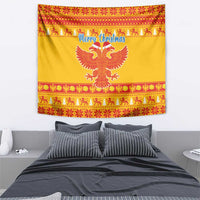 Yellow Christmas tapestry with eagle crest, 'Merry Christmas' script and festive red border
