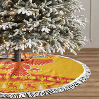 Yellow Christmas tree skirt with eagle center and white fringed border