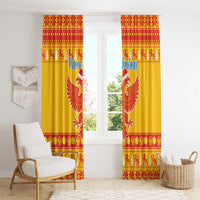 Yellow Christmas curtain panels with double-headed eagle design and red patterned trim