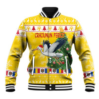 Yellow unisex baseball jacket with stork, Christmas trees, and Santa-themed graphic, ribbed cuffs
