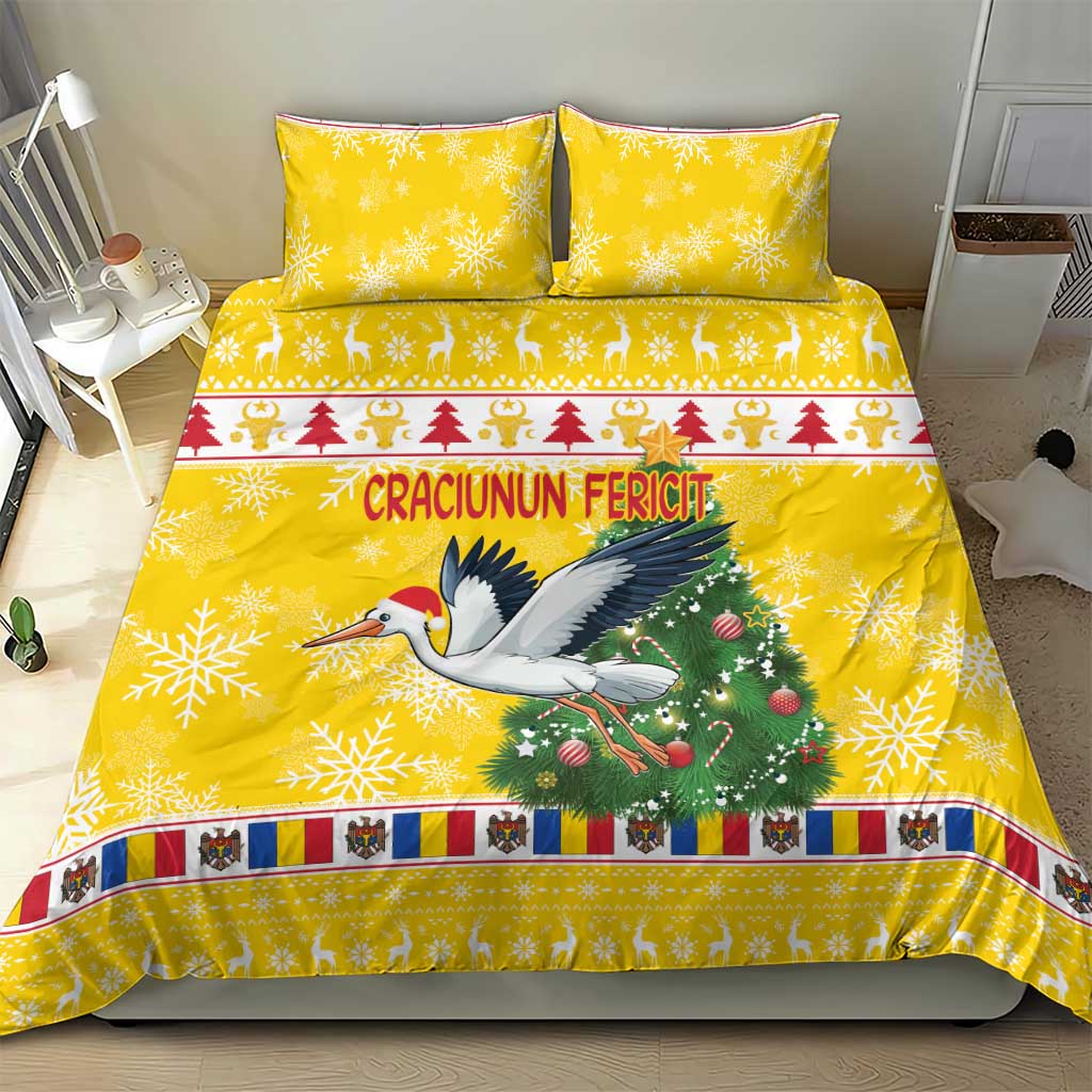 Yellow Christmas bedding set with stork, green tree, and striped decorative border