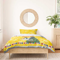 Yellow Christmas bedding set featuring stork, green tree, and matching pillow shams