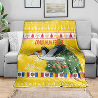 Yellow Christmas blanket with stork, pine tree, and “Craciunun Fericit” print
