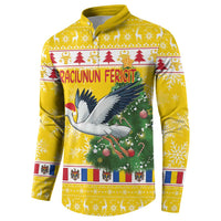 Yellow zip-front sweatshirt with stork over Christmas tree and festive border pattern