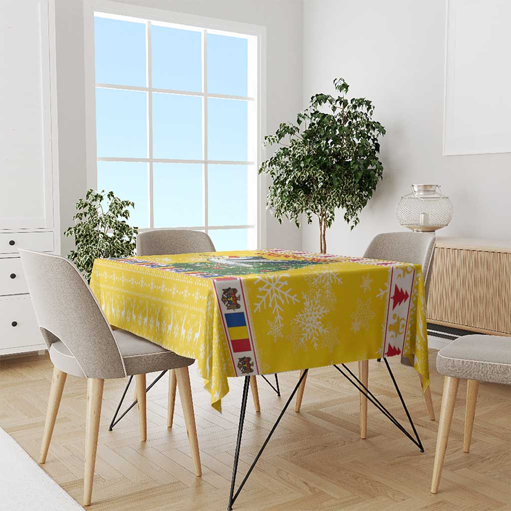 Yellow Christmas tablecloth with stork, Santa, and Christmas tree prints