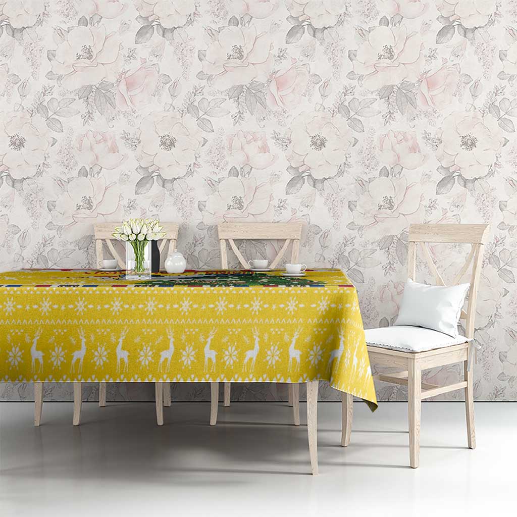 Yellow tablecloth with snowflake and festive motif pattern