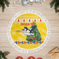 Yellow round tree skirt with stork carrying a branch, festive banner, and white fringe