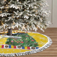 Fringed yellow tree skirt laid on floor under a decorated Christmas tree, stork print