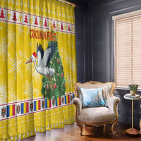 Yellow Christmas curtain with large stork-and-tree scene and holiday garland border