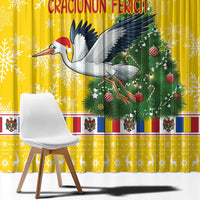 Close view yellow Christmas curtain with stork, green tree, snowflake pattern, and banner